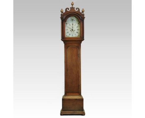 A late George III oak cased longcase clock, the arched painted dial with Roman hours, signed Dan Dade, Bungay, having a twin 