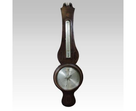 A 19th century mahogany cased wheel barometer, the swan neck pediment centred by a turned ivory finial, the trunk with chevro