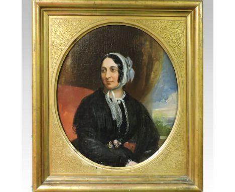 English school, 19th century, portrait of a lady seated by a window, oil on canvas, 27 x 23cm