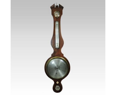 A 19th century mahogany cased wheel barometer, the swan neck pediment centred by an ivory finial, the trunk inset with a dry 