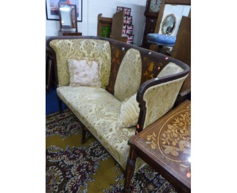 A 19TH CENTURY ART NOUVEAU STYLE MAHOGANY INLAID BENCH, the high raised back extending around both sides with gold upholstery