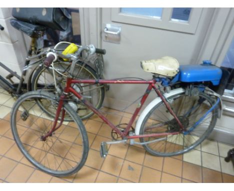 A 1979 ELSWICK HOPPER WHIRLWIND BICYCLE, fitted with Trojan 49cc petrol engine, red and white paintwork, V5c present, reg no 