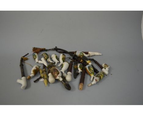 THIRTEEN CERAMIC PIPE BOWLS, with deer/stag decoration, some with long stems (13) (a/f)