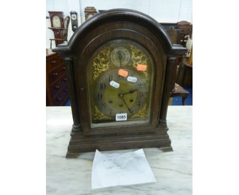 A VICTORIAN OAK CASED BRACKET CLOCK, the brass arched dial with silvered chapter ring movement marked GB (Gustav Becker) (pen