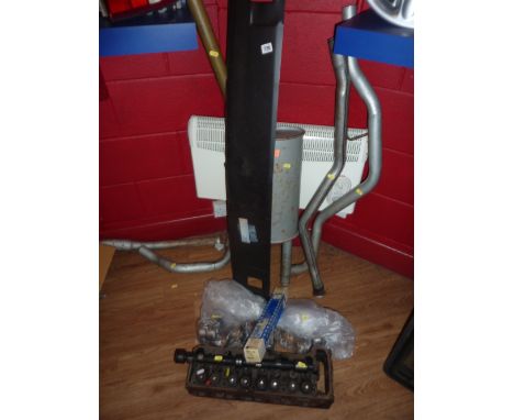 A SELECTION OF VINTAGE CAR PARTS, including exhaust parts, engine parts and Ford Capri body panels