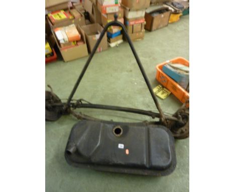 A VINTAGE CAR AXLE, and fuel tank