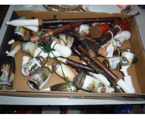 A COLLECTION OF CERAMIC PIPE BOWLS, some with long stem attachments, all decorated with animals (14)