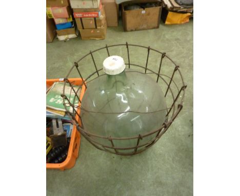 A VINTAGE CARBOUY IN  WIRE FRAME
