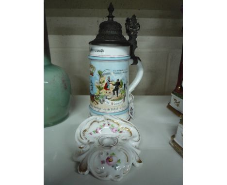 AN IMPERIAL GERMAN ARMY BEER STEIN, in porcelain with pewter lid, together with a Rococo style ceramic inkwell (s.d.) (2)