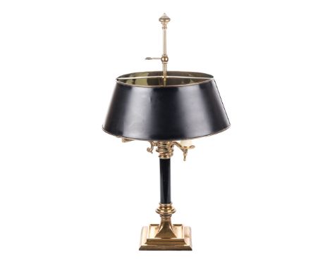 A BRASS DESK LAMP triple light fitting on c-scroll shaped supports, cylindrical black column on a stepped square base, fitted