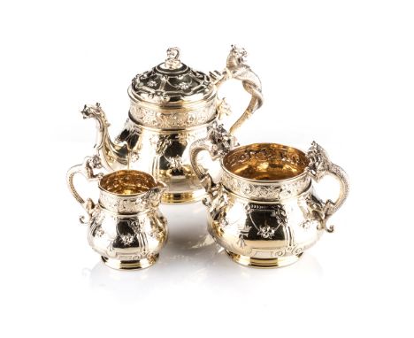 A LATE VICTORIAN SILVER-GILT BACHELOR'S TEA SERVICE, HENRY WILLIAM CURRY, LONDON, 1875 comprising: a teapot, sugar basin and 