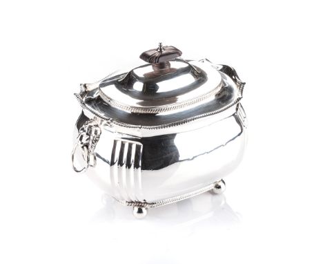 A MID-VICTORIAN SILVER TEA CADDY, MAKER'S MARK I S, LONDON, 1854 of rectangular bulbous form with gadroon rims, each side mou