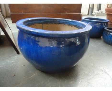 A large round stoneware planter, blue glazed, 50cmD