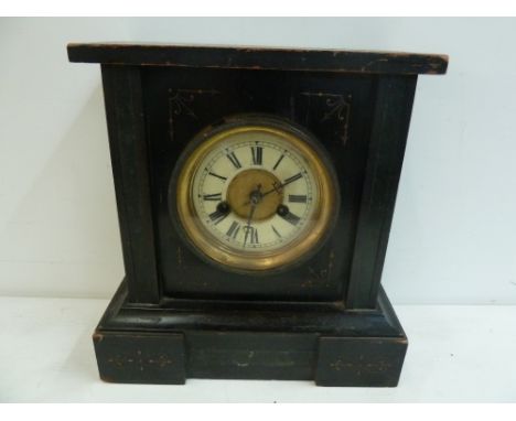 A 19th century mantle clock, enamel dial with Roman numerals, with a black painted wooden case