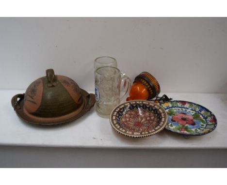 A quantity of glassware and ceramics including a stoneware cheese dish and cover, decorative plates and glass tankards