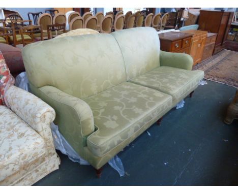 A modern three seater sofa, green floral upholstery, 195cmW