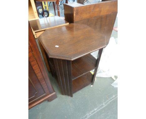 A 20th century oak side shelf/bookcase, octagonal top, over two shelves, 52cmW