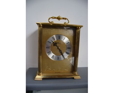 An Avia Quartz brass mantel clock, metal dial with Roman numerals