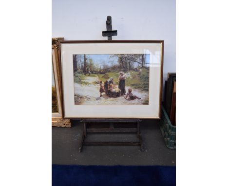 A vintage adjustable artists table top metal easel together with a framed Fred Morgan print (2)