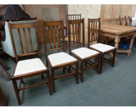 Four mid 20th century oak dining chairs and a teak G-Plan coffee table with slatted under shelf 40cmH