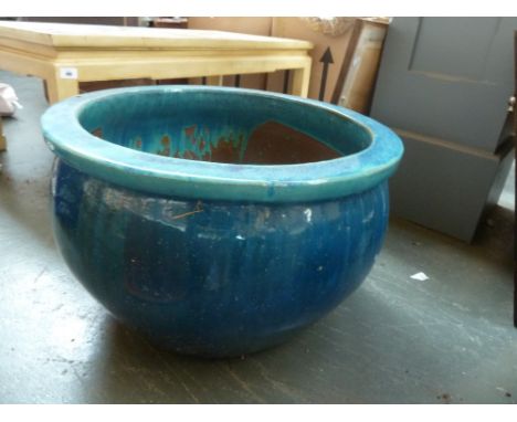 A large round stoneware planter, turquoise and blue glazed, 50cmD