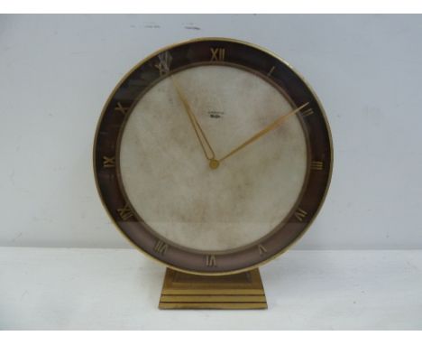 An Art Deco circular mantle clock, dial with Roman numerals inscribed Junghans Meister