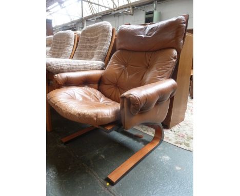 A Rykken and Co. Norway, imitation rosewood framed armchair with button back leather covering, mark to base