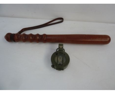 Military prismatic marching compass by Stanley of London ex-MOD and a wooden Police truncheon with leather strap