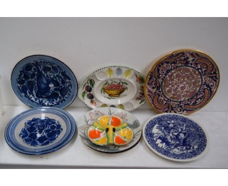 A quantity of ceramics including large decorative plates and platters, three cordon bleu 'The Franklin Mint' jelly moulds, va