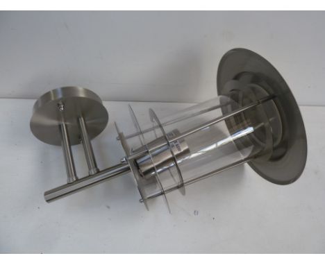 A stainless steel wall lantern model ST011 in box