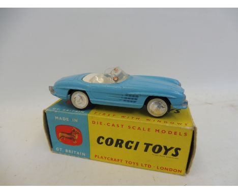 A boxed Corgi no. 303 Mercedes-Benz 300SL in blue, with wire hub leaflet.