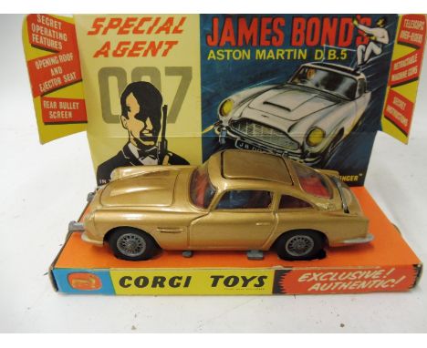 Corgi Toys - 007 James Bond's Aston Martin DB5, no. 261, box excellent, inner in bright excellent condition, suspension, rear