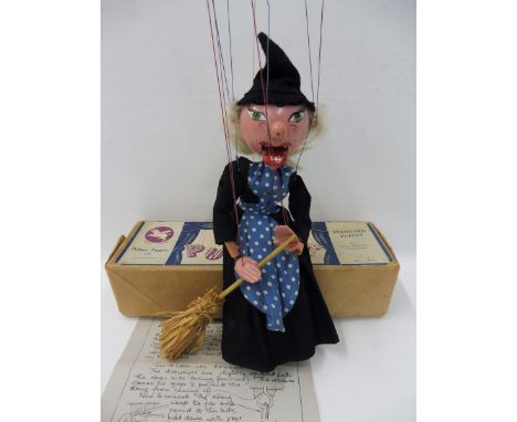 A boxed Pelham Puppet - Witch, late 1950s, small hole to sleeve, staples rusty, with original strings, controller and instruc