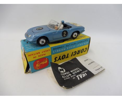 A boxed Corgi Toys no. 318 Lotus Elan SII bearing Esso 'I've got a tiger in my tank' decals, with club leaflet. 