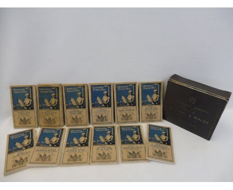 A cased set of Ordnance Survey maps.