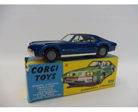 A boxed Corgi Toys no. 264 Oldsmobile Tornado in blue, with club leaflet.