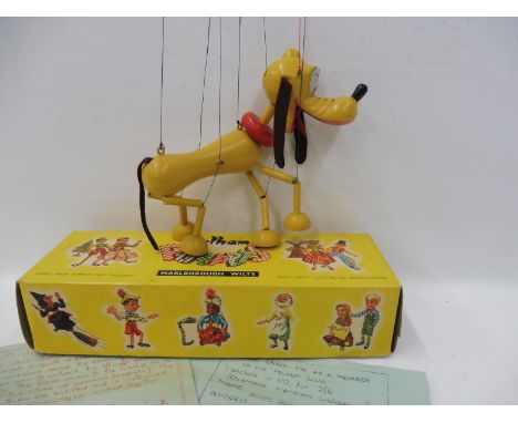 A boxed Pelham Puppet - Walt Disney character Pluto, early 1960s with original strings, instructions and controller, felt wor