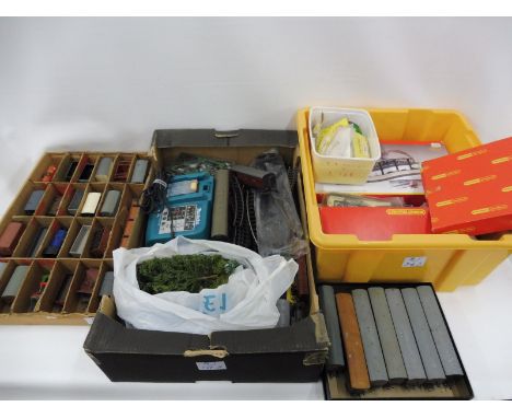 A quantity of railway accessories, track and rolling stock including Hornby and Bachmann etc.  