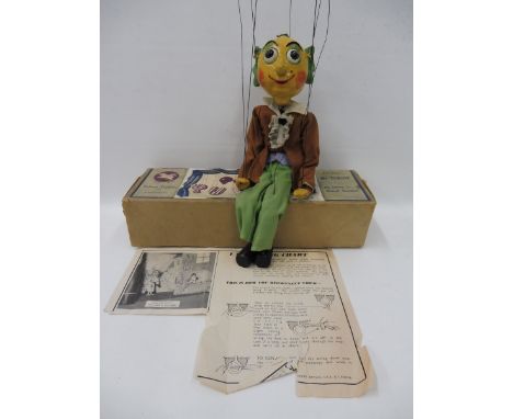 A boxed Pelham Puppet - Mr. Turnip, from the Whirligig programme, 1950s, small paint loss, with original strings, controller 