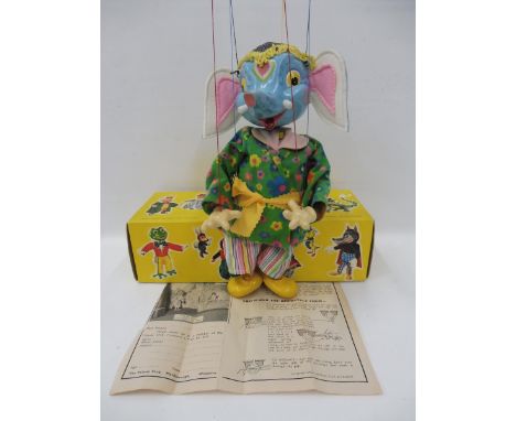 A boxed Pelham Puppet - Elephant, 1960s with solid trunk, composite hands, instructions, original strings and controller. 