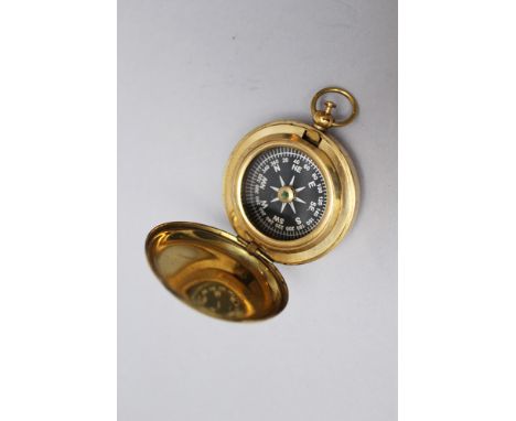 Pocket compass gilded bronze open mechanism 20th Century. 5 cm diameter 