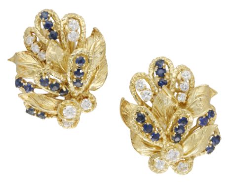 A pair of 18ct gold sapphire and diamond ear clips by Ben Rosenfeld Ltd, 1969, the floral sprays of bombé form and textured f
