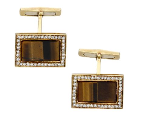 A pair of tiger’s eye and diamond cufflinks, circa 1970, each set with a rectangular tiger’s eye panel within a surround of s