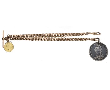 A 9ct gold Albert chain, 1929, the fancy curb-link Albert chain suspending an 1892 Victoria crown and an 1817 George III half