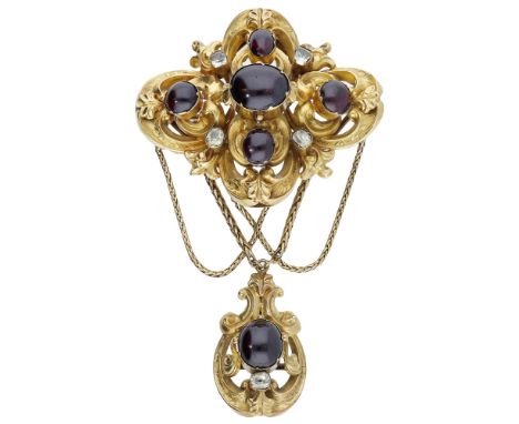 A mid 19th century gem-set brooch, the lozenge-shaped scroll surmount set with garnet cabochons and vari-cut chrysoberyls in 