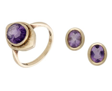 A 9ct gold amethyst ring and earring suite, the lozenge-shaped ring collet-set with an oval-cut amethyst, London hallmark, to
