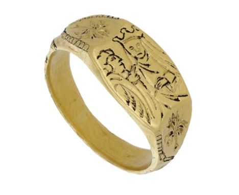 A late 15th century gold iconographic Annunciation ring, the band of D-shaped cross section decorated to the exterior with di