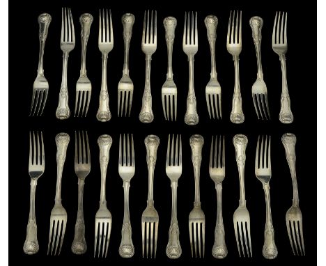 A George III and later silver flatware service of kings pattern, comprising 24 table forks, 11 table spoons, 6 dessert forks,