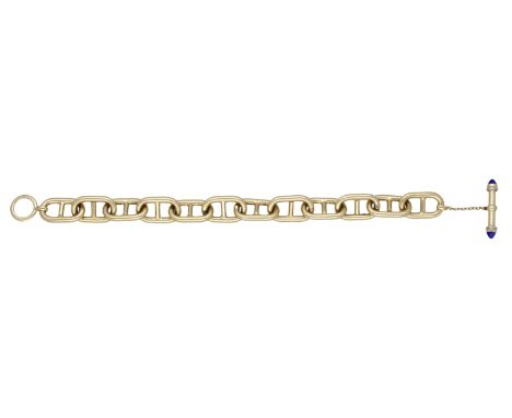 A fancy-link bracelet, possibly by Hermès, the fancy-link chain leading to a T-bar terminal set with sugarloaf lapis lazuli c