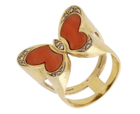 An 18ct gold coral and diamond butterfly dress ring, 1976, the wings set with Corallium rubrum panels and with brilliant-cut 